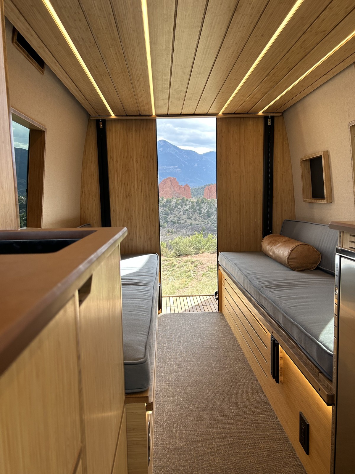 The Den lounge and galley with a view through the open rear passage.